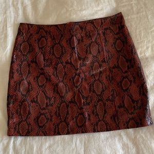 NWT Nasty Gal red snakeskin slit mini skirt in size 10